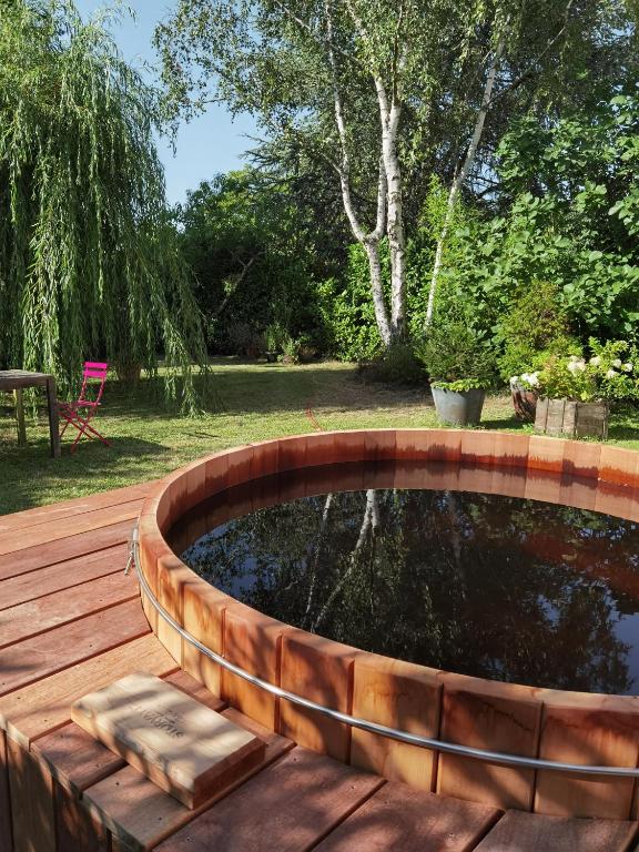 2 chambres avec jardin et jacuzzi dans une maison familiale - B&B Noisy-le-Roi