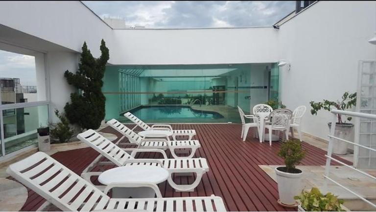 Apartamento pé na areia com piscina aquecida - B&B Guarujá