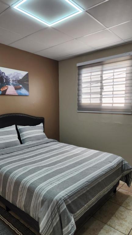 The Layover - Modern 2BR 6 mins from the Airport Ideal for Short and Extended Stays - B&B Kelly Village