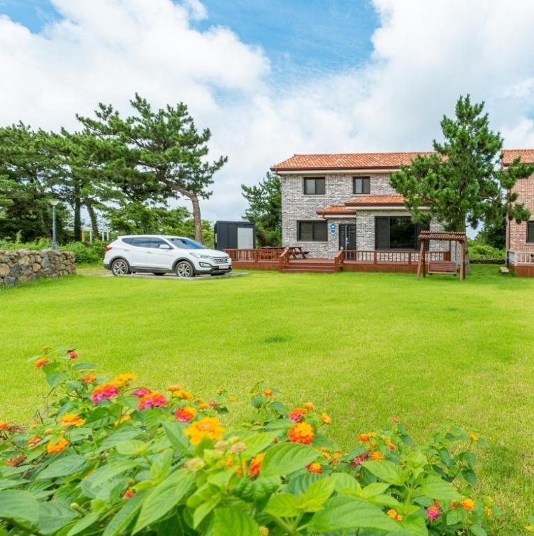 Jeju Sunshine Pension - Ferienwohnung Jeju