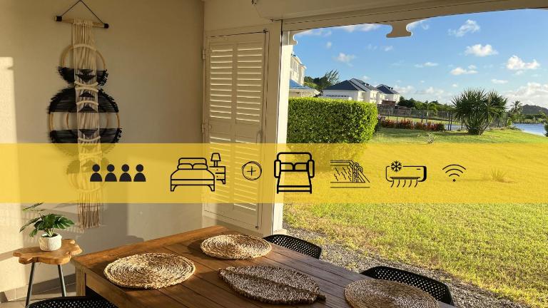 Le Baileys - Spacieux appartement en rez-de-jardin vue lagon - Ferienwohnung Marigot