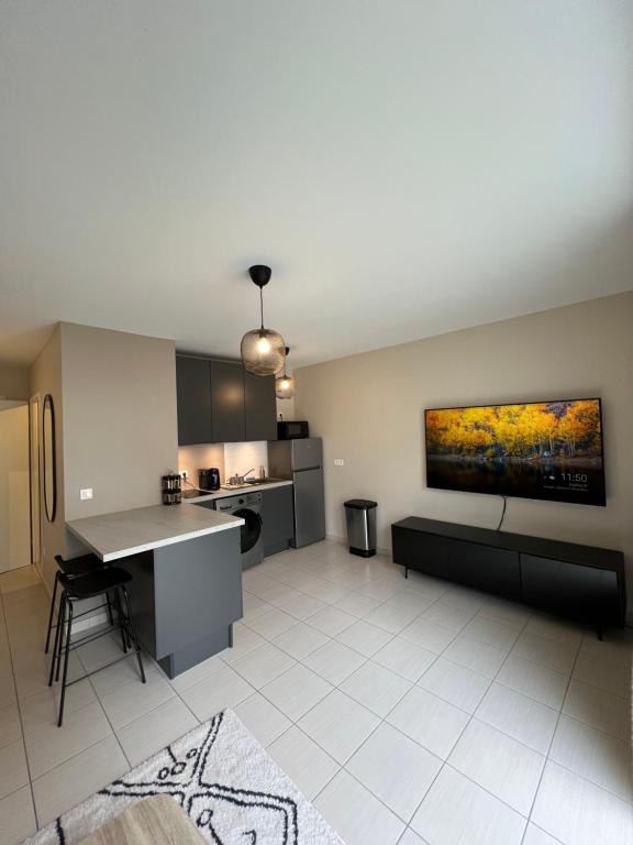 Charmant studio en résidence avec parking - B&B Bussy-Saint-Georges