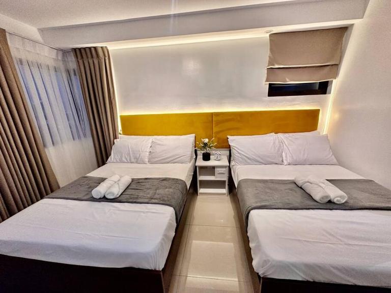Hotel Living,The Persimmon double beds 4pax (904) - Chambres d'hôtes Cebu