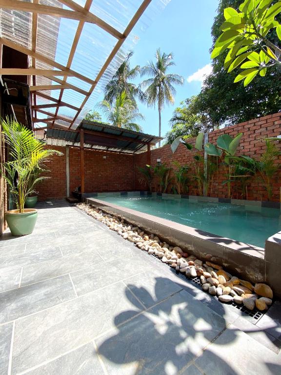 Kutum's Wooden House - Private Pool, Breakfast & Cafe - Bed and Breakfast Kampung Huma