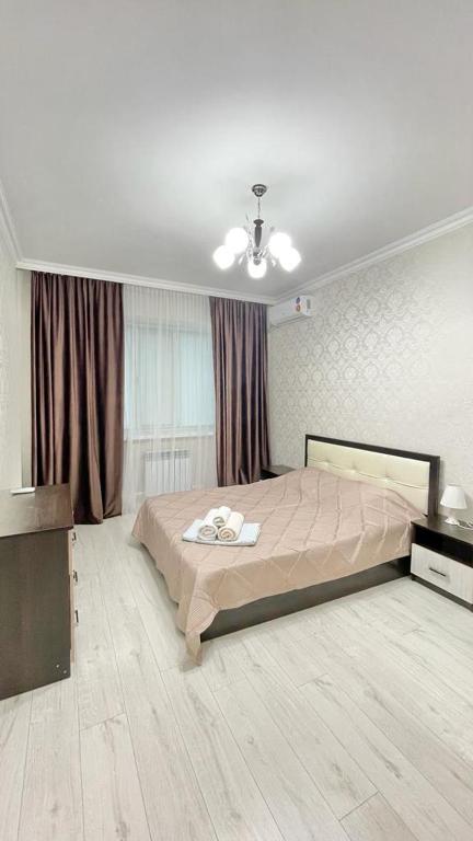 # 21 Солнечная и светлая квартира - B&B Atyrau