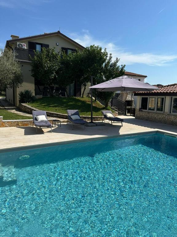 Ferienhaus Marija mit Pool - Chambres d'hôtes Vilanija