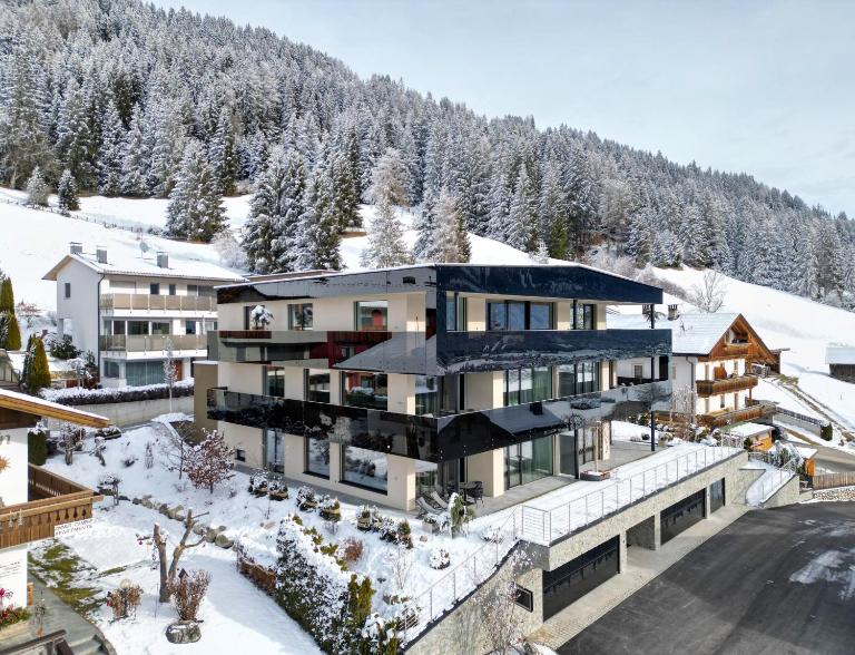 Timeless Dolomites Apartments - Chambres d'hôtes Dobbiaco