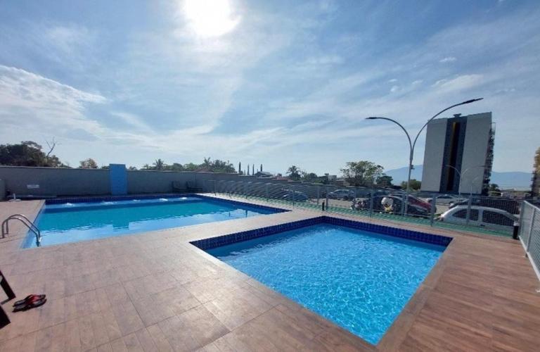 Apartamento na Palhoça, com vista para o mar, próximo a mercados, padarias e farmácias. - Bed and Breakfast Palhoça