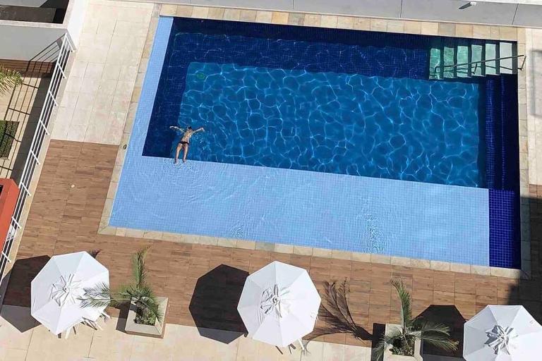 Apartamento Enseada Villa Di Fiori com piscina - Ferienwohnung Guarujá