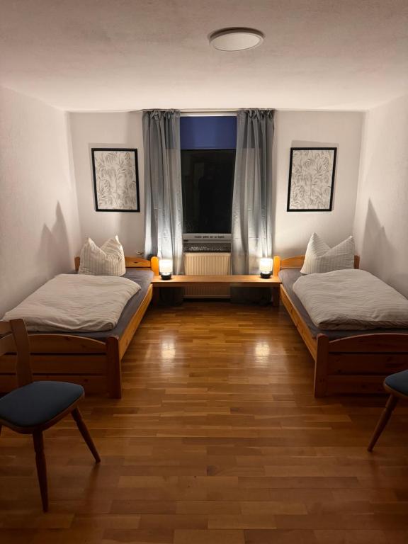 Pension FAULPELZ - Zweibettzimmer Standard - Ferienwohnung Niederorschel
