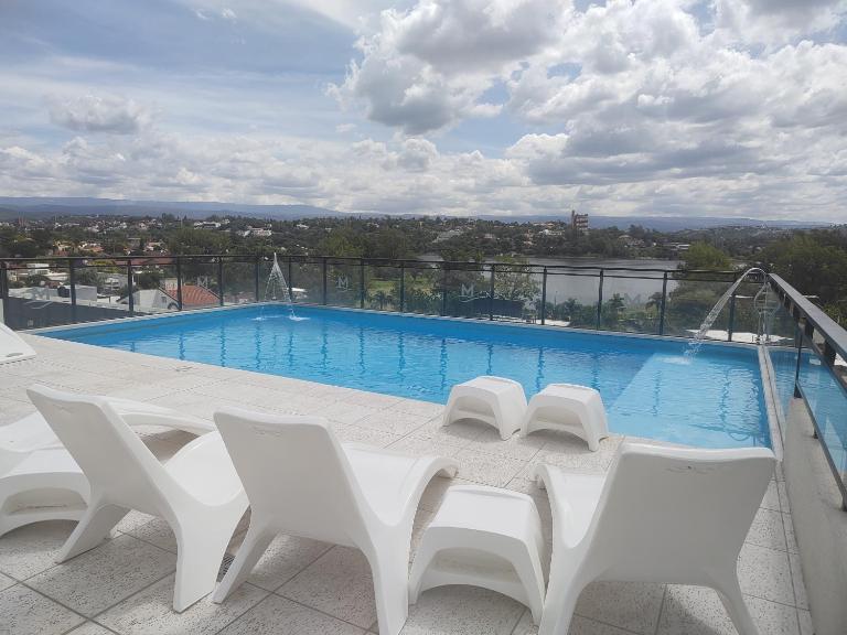 Villa Carlos Paz departamento con pileta - Chambres d'hôtes Villa Carlos Paz