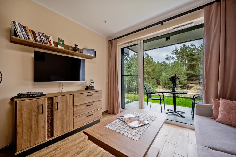 Apartament Orlando w Porto Łeba 350m od morza - Chambres d'hôtes Łeba