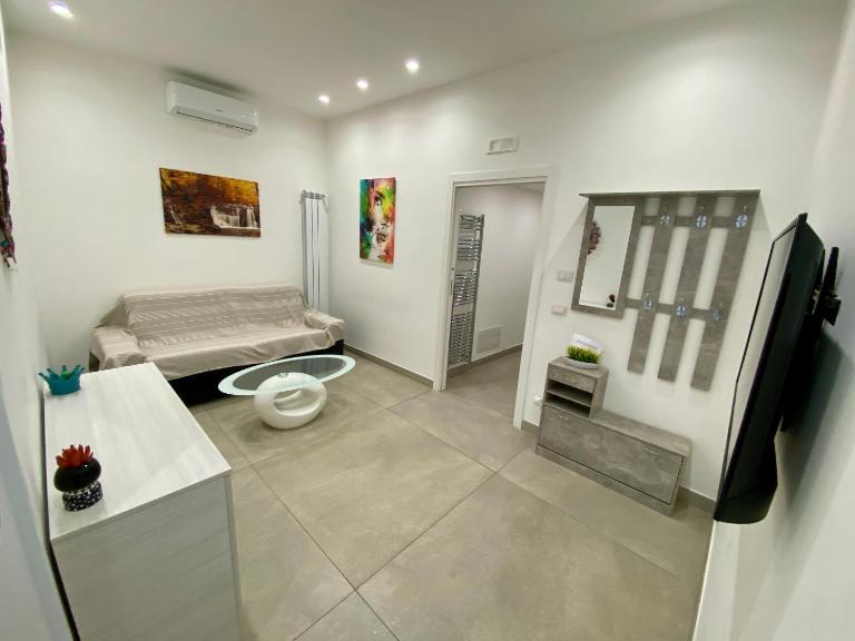 Appartamento Casa Crispino Piano terra per 3 persone - Chambres d'hôtes Frattaminore