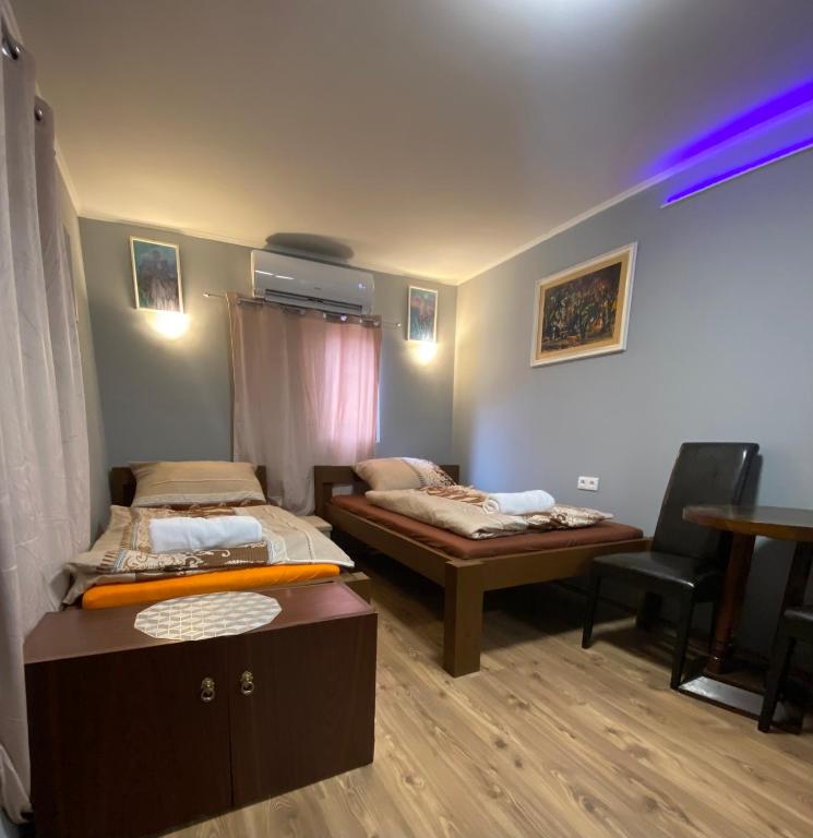 Babér Apartmanház Balatonakarattya - Ferienwohnung Balatonkenese