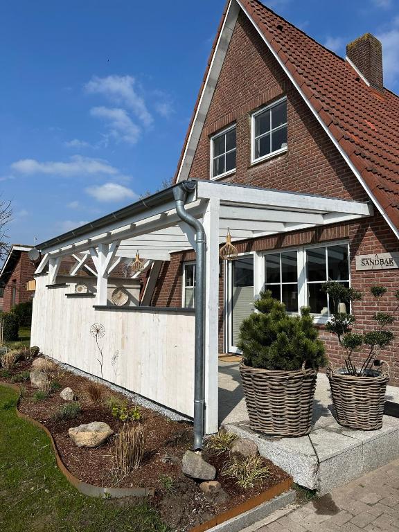 Ferienhaus Sandbar direkt am Deich - Ferienwohnung Spieka-Neufeld