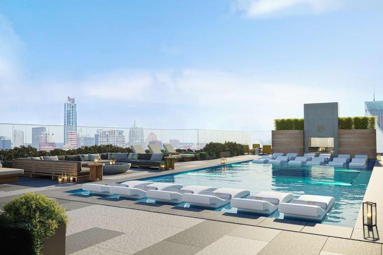 2BR Condo near Rainey St - Heated Pool - Gym - Bar - B&B Austin