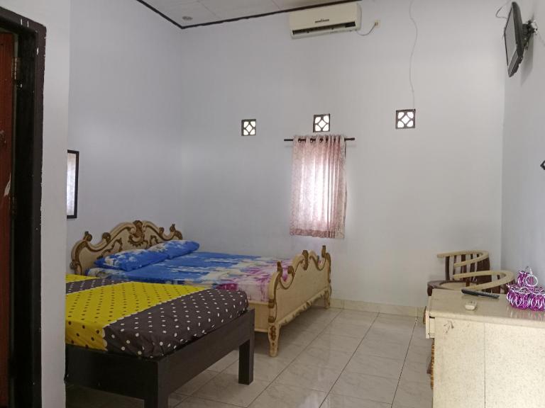 Wisma Anugerah Jaya - Ferienwohnung Bira