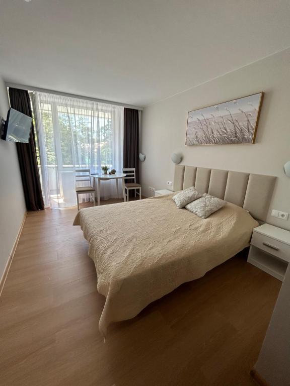 Alkos apartamentai - Ferienwohnung Palanga