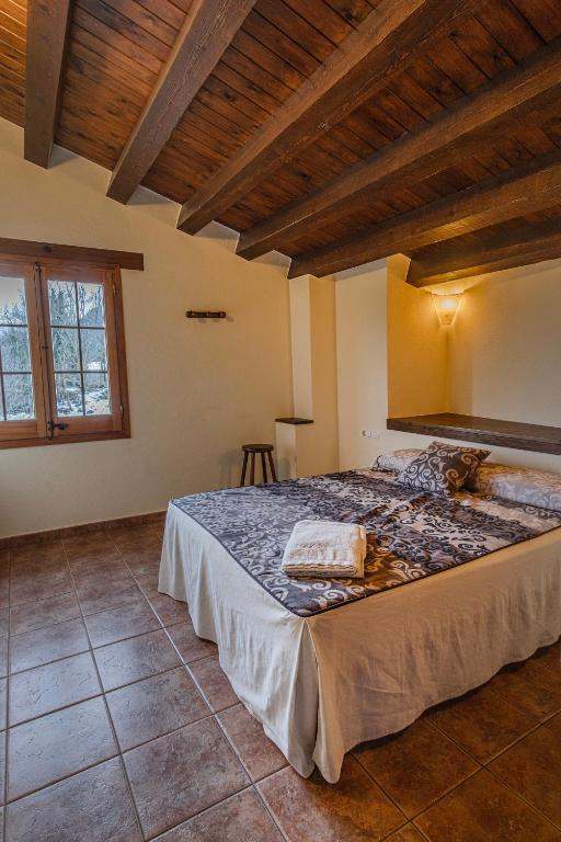 Can Tubau - Casa rural - Apartaments - B&B Campelles