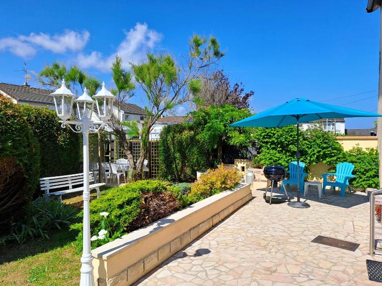Le Caprice de la mer - maison avec véranda, jardin - B&B Luc-sur-Mer