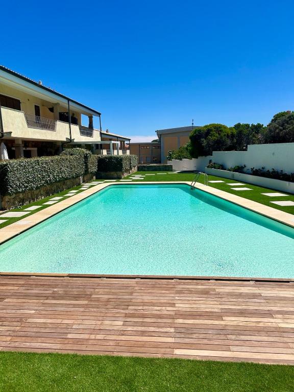 Appartamento incantevole con piscina - B&B Palau