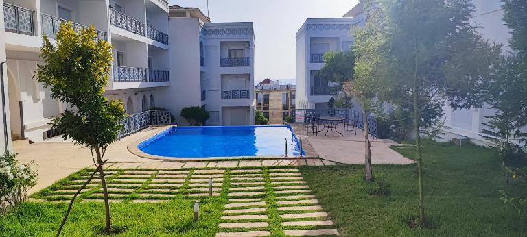 Magnifique Appartement de standing à Tanger avec Vue sur Mer et Accès Piscine - B&B Tangeri
