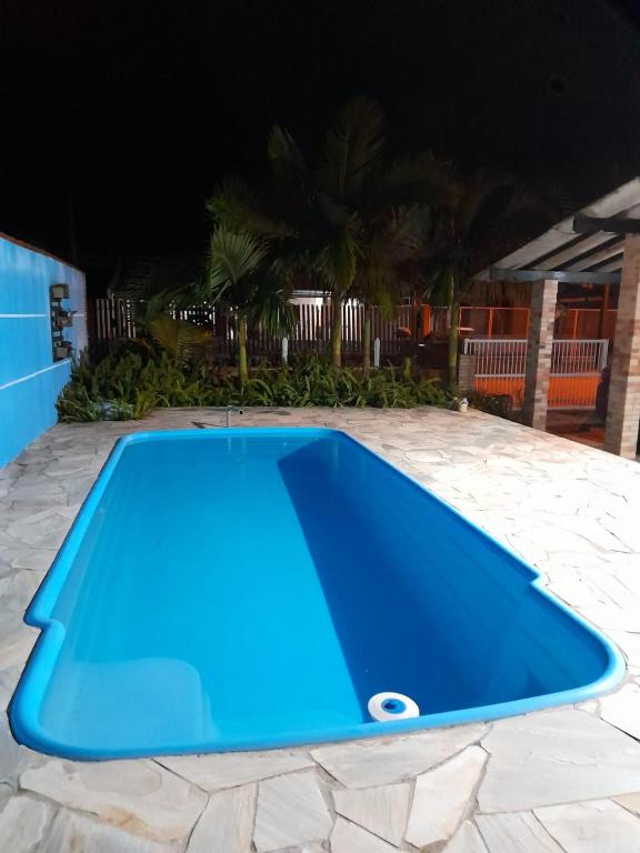 casa aconchegante com piscina e jardim - B&B Pontal do Paraná