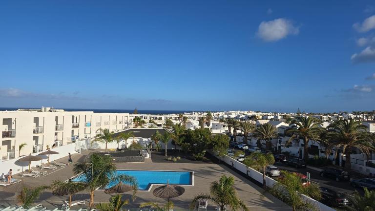 Apartment Namaste- Amazing sea view & infinity pool - good Wifi - smart tv-Residence Senator - Ferienwohnung Costa Teguise