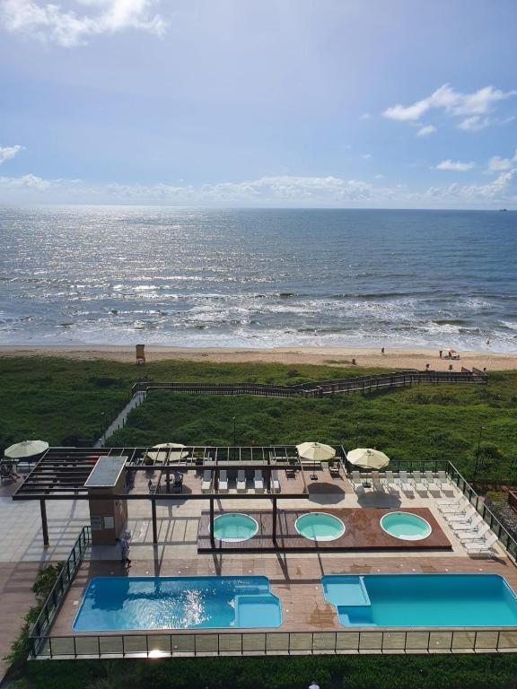 Apartamento Pé na Areia! Piscinas aquecidas! Beto Carreiro World-20 min - Bed and Breakfast Barra Velha