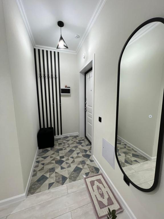 ЖК Өрлеу уютная квартира - Chambres d'hôtes Taldykol’