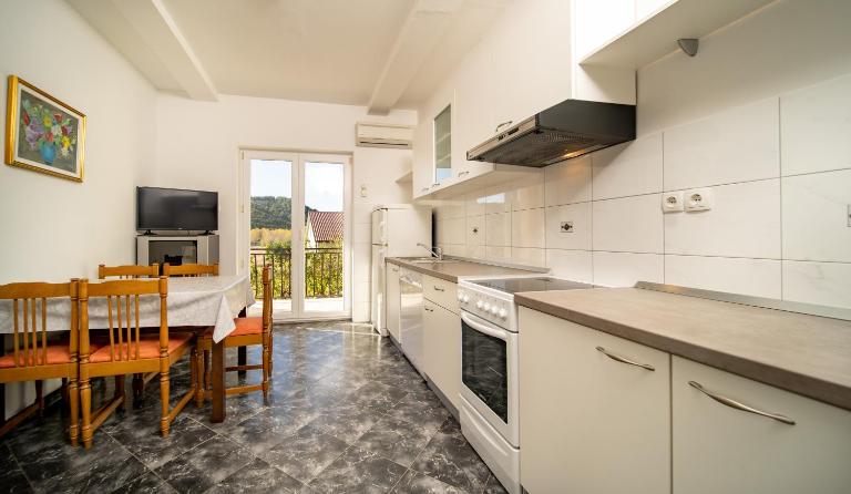 Apartmani Rajka Paparić - Chambres d'hôtes Lopar