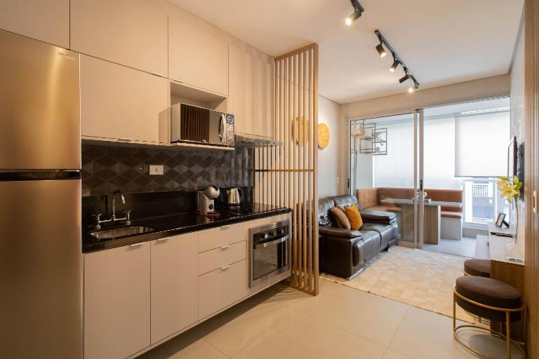 Apartamento super completo no Helbor Patteo Bosque Maia, com vaga de estacionamento, mercado 24h ao lado e a 11km do Aeroporto Internacional de Guarulhos - Chambres d'hôtes Guarulhos