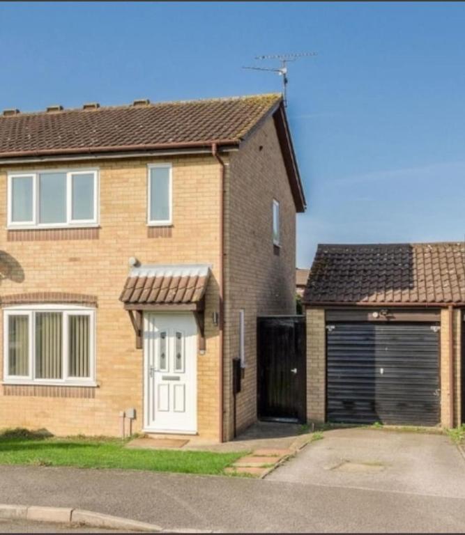 Entire cosy Apartment in a quiet lovely area with parking - Chambres d'hôtes Wellingborough