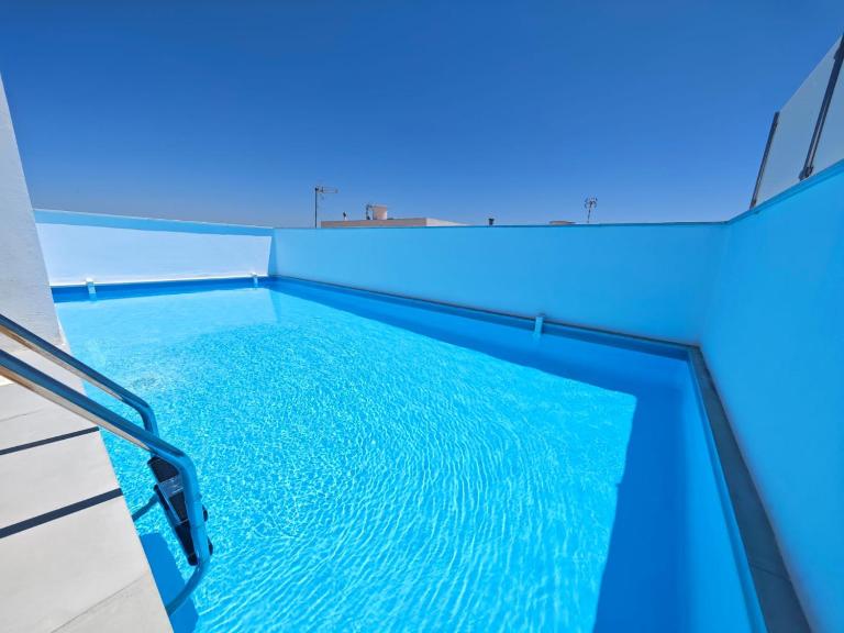 Apartamento a estrenar en Planta Primera B con piscina - Chambres d'hôtes Barbate
