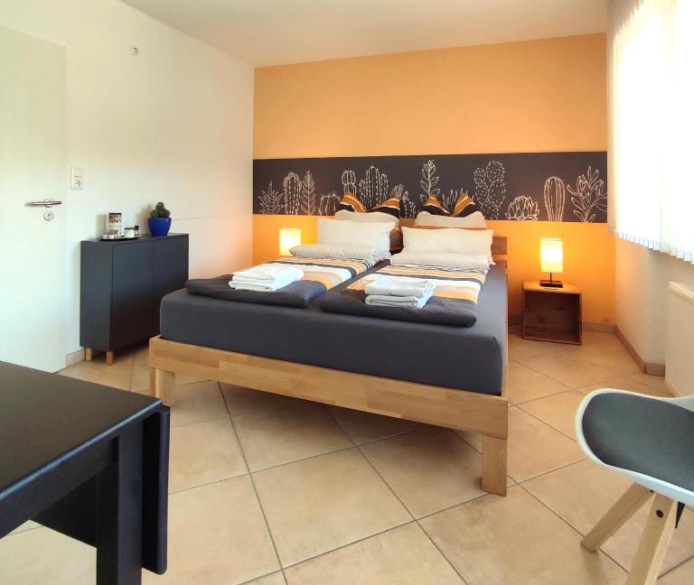 Zimmer mit Terrasse am Jakobsberg - Ferienwohnung Ockenheim