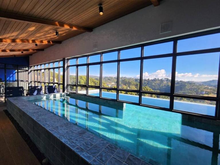 Apartamento com jacuzzi privativa no Wanderlust Hotel - Bed and Breakfast Campos do Jordão