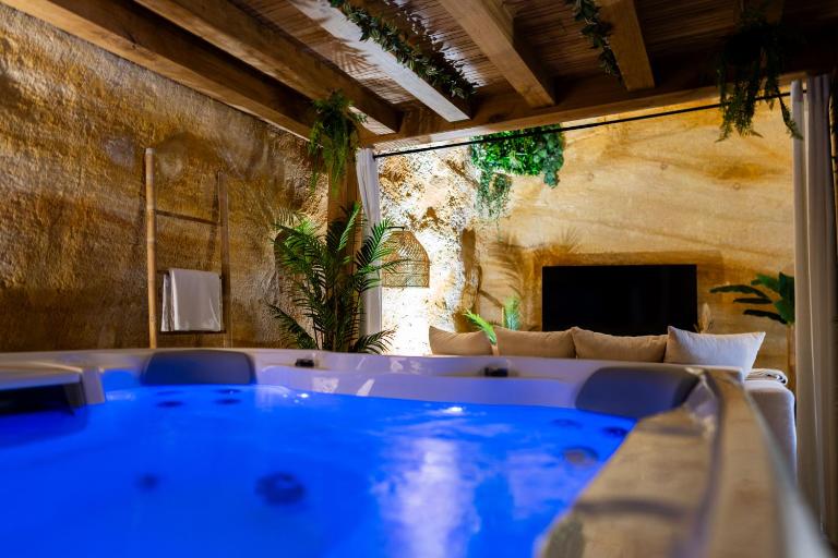 Suite troglodyte & spa privé - Luxe et détente - Ferienwohnung Doué-la-Fontaine
