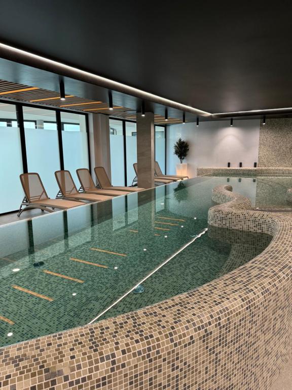 Baltic Waves Resort Luksusowy apartamnet z basenem i parkingiem - Chambres d'hôtes Międzyzdroje