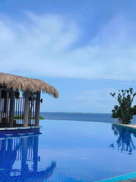 Budget friendly 1bedroom in The Mactan Newtown with pool&beach access - B&B Binotongan