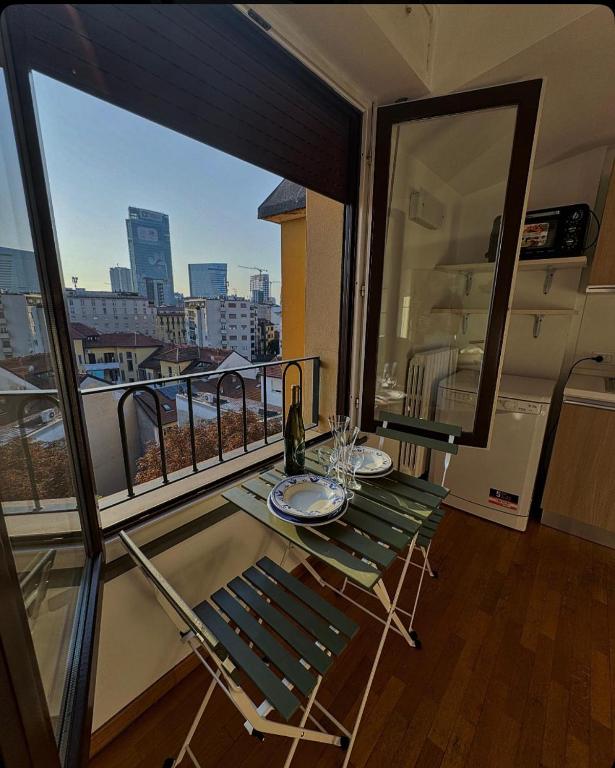 Attico con Balcone in Centro a Milano Isola - B&B Milano
