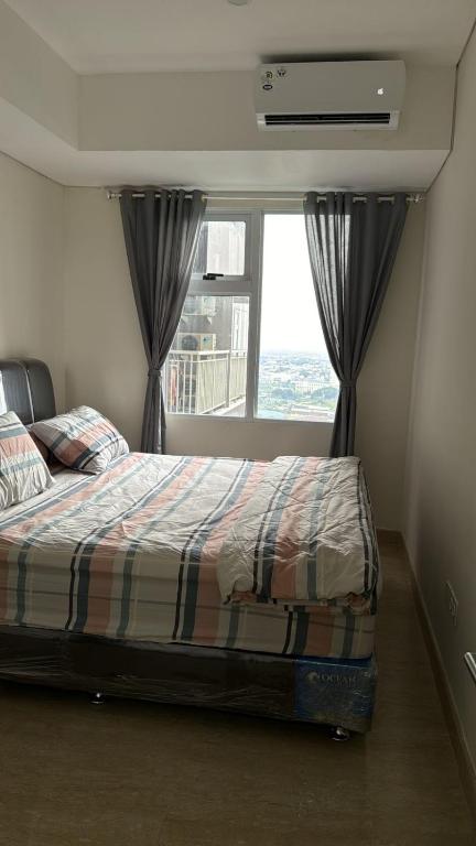 Apartemen Podomoro Deli Medan - Ferienwohnung Medan