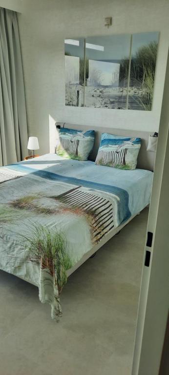Cozy apartment with sea view and parking place - B&B Bredene