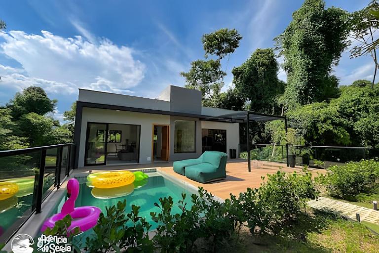 Casa em condomínio perto da Praia da Feiticeira - Ferienwohnung Ilhabela