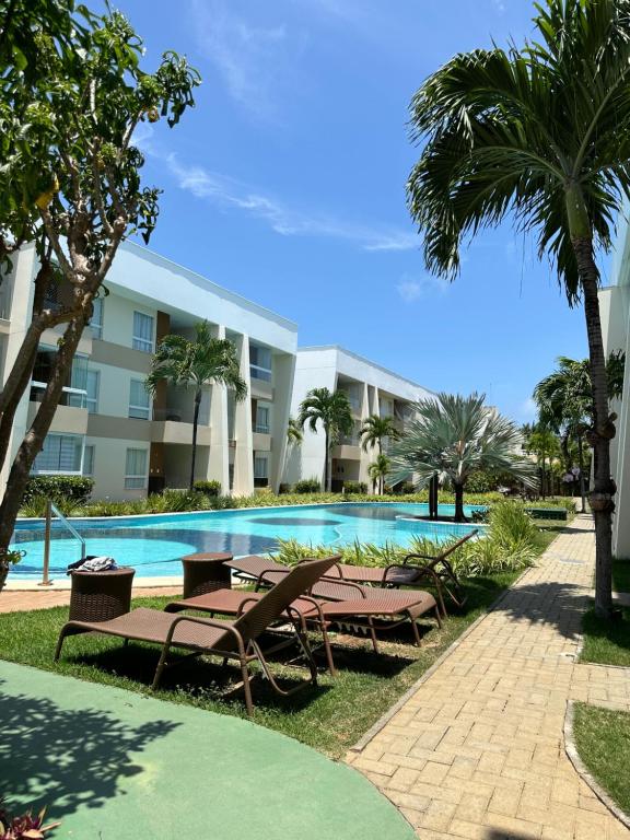 Apt hotel praia Guarajuba condominio Porto Smeralda praia excluisiva - B&B Guarajuba