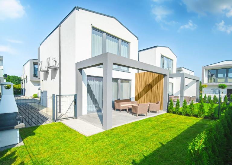 Apartament SUPERIOR Rewal - całoroczny dwupoziomowy dom z ogródkiem - B&B Rewal