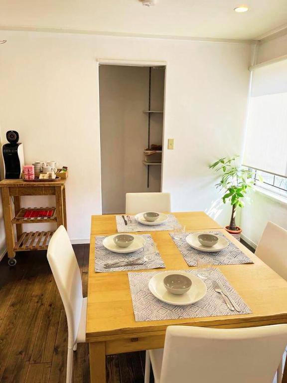 アイビーコテージアパートメント - Chambres d'hôtes Kamikumamoto