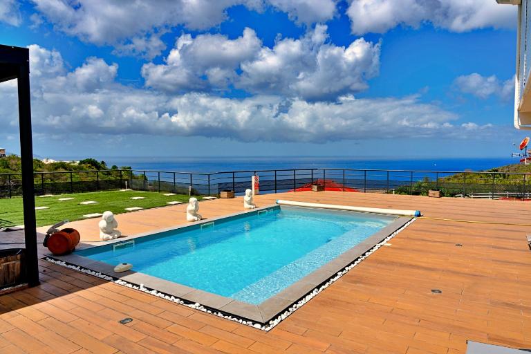 Magnifique appartement MISIK vue sur mer, piscine - Chambres d'hôtes La Case Pilotte