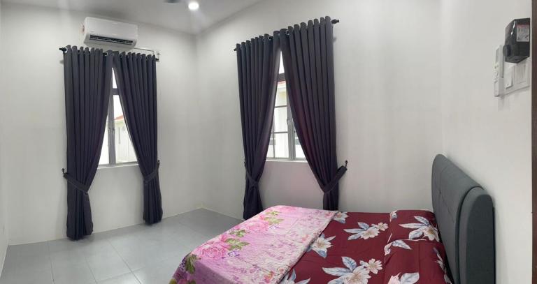 IzzaraRaiz Roomstay - B&B Pokok Sena