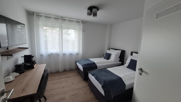 Apartments Seibel Doppel-Zweibettzimmer mit Bad - B&B Reutlingen