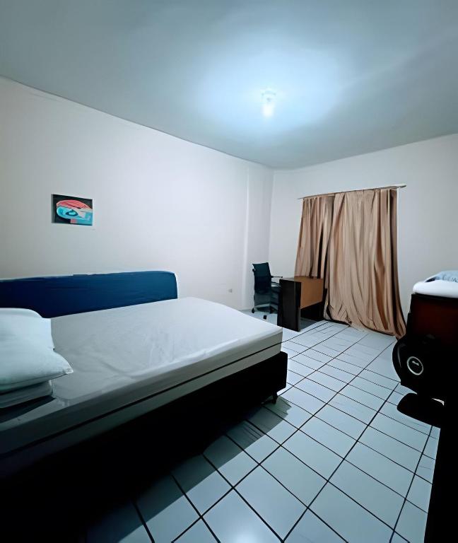 Apartamento em Praia Grande a 750 metros da praia ideal para familias - Excelente custo x Beneficio - Home Office - Pet Friendly - Chambres d'hôtes Praia Grande